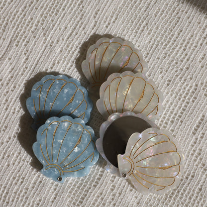 Shell folding hand mirror