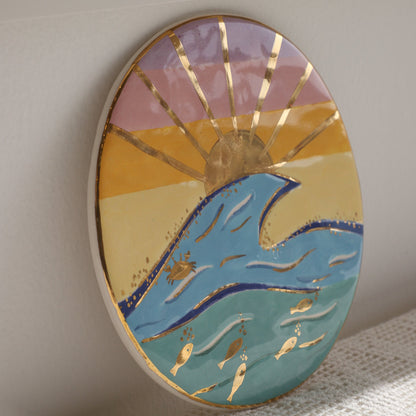 Decorative wall art with abstract design on a light gray background