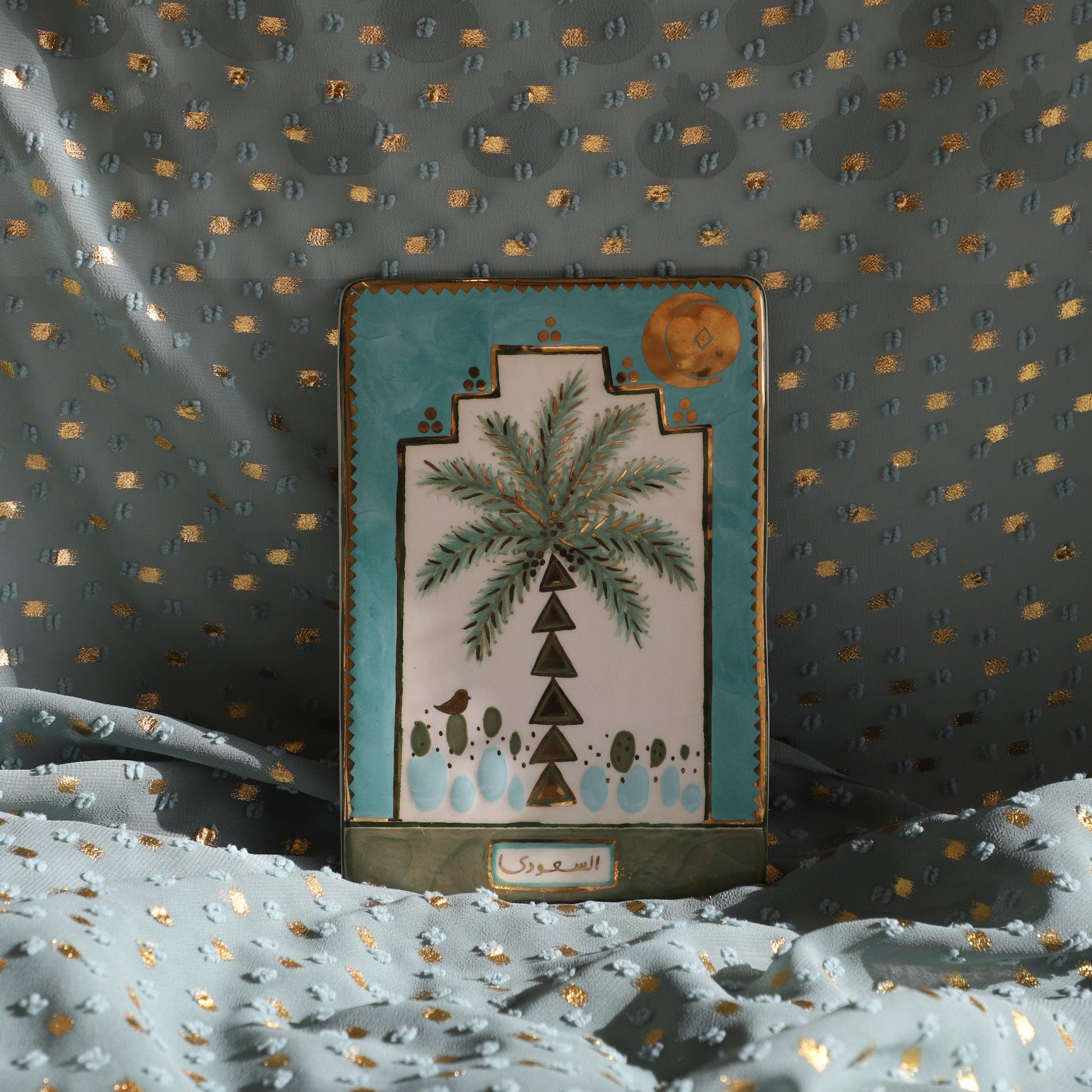 Decorative patch with geometric design on a textured fabric background